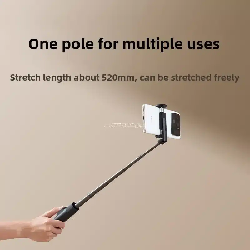 Xiaomi selfie stick tripod used with smartphone outdoors