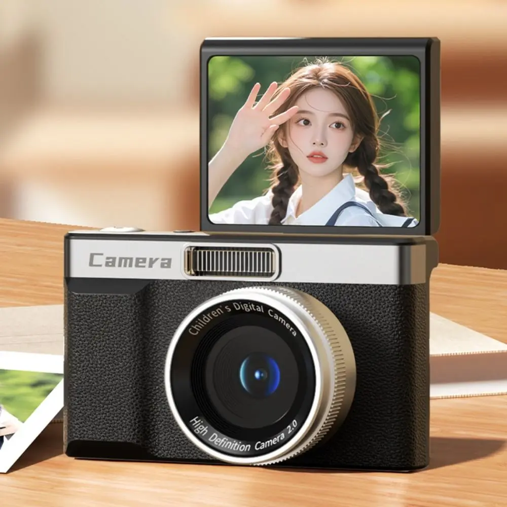 Side angle of mini digital camera with autofocus and flip screen