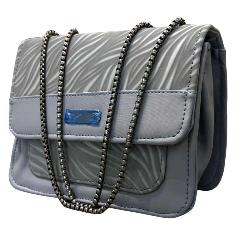 1_1758777794.webp Grey crescent-shaped women's shoulder bag in faux leather front view
