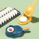 2-in-1 manual dumpling maker and dough press tool on white background