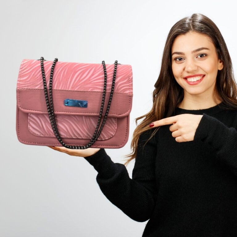 Pink crescent-shaped women’s shoulder bag front view