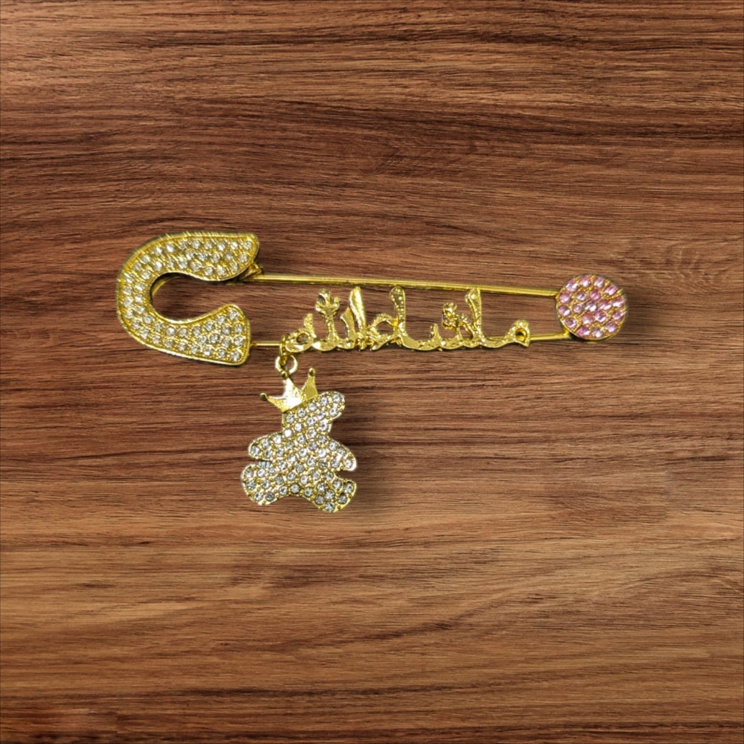 3d2bad6b912d7db67fd012d7ea32d0ad.jpeg Mashallah Safety Pin with Rhinestone Bear Charm – Islamic Baby Gift & Protection Accessory - Image 1