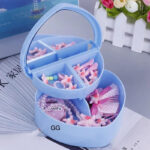 Heart shaped jewellery box with colorful cartoon design closed view