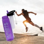 Purple 1000ml sports water bottle with built-in straw and leakproof lid