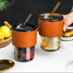 13oz bamboo lid glass cup with leather sleeve front view