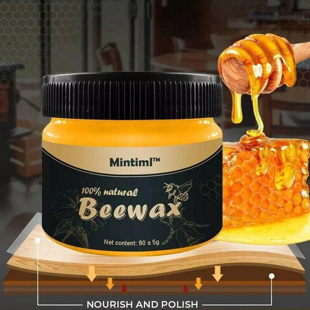7706f3b5732e4acb0610fae198791410.jpg Mintiml Natural Beeswax Wood Polish bottle on wooden surface