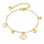 Close-up of 18K gold plated hearts bracelet on wrist