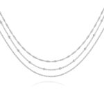 Stainless steel necklace with lobster claw clasp on white background
