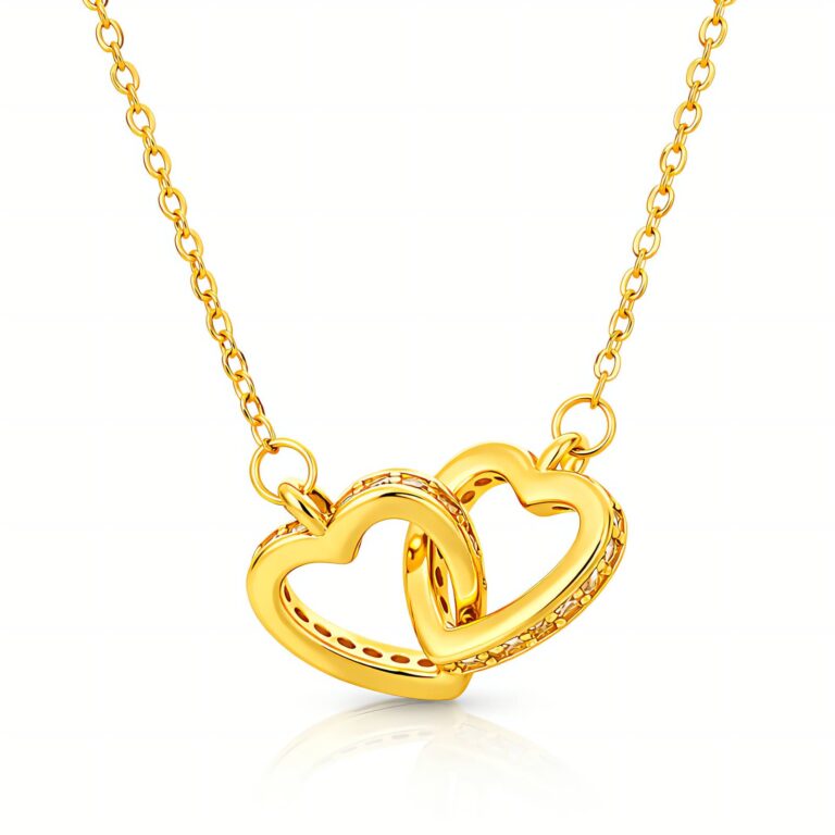 Close-up of 18K gold plated hearts necklace on white background