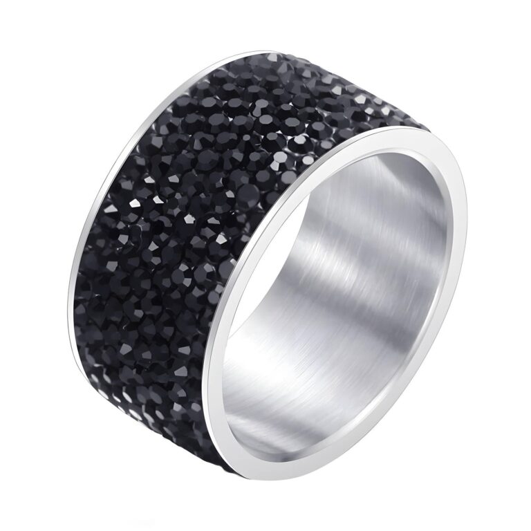 Close-up of stainless steel ring with cubic zirconia inserts