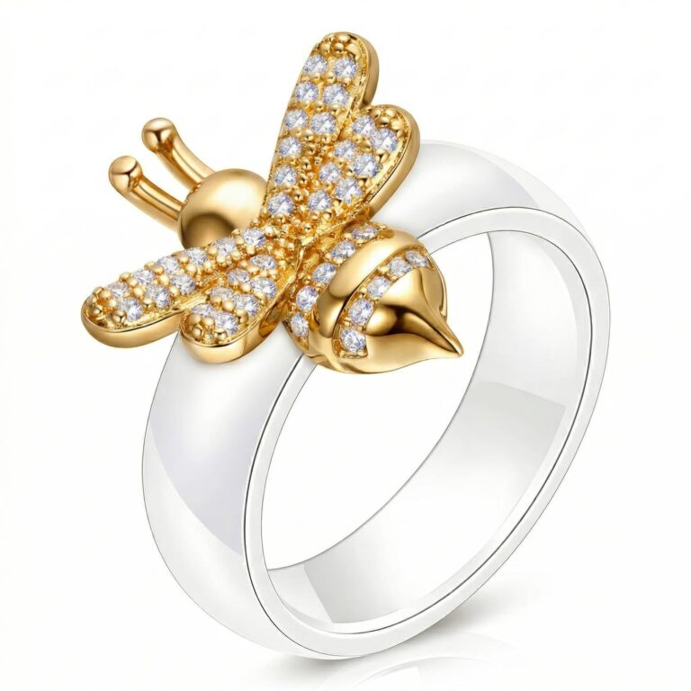 Close-up of 18K gold plated bee ring with cubic zirconia on stainless steel