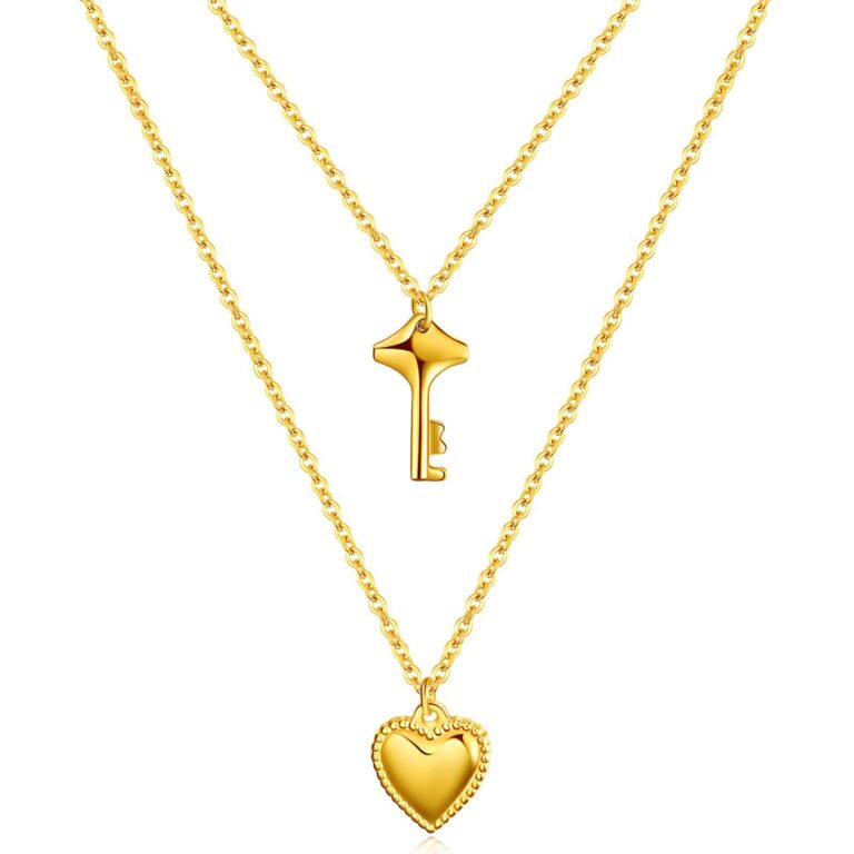 18K gold plated heart and key necklace on white background