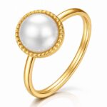 18K gold plated stainless steel ring with imitation pearl on white background