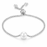close-up of elegant stainless steel pearl imitation bracelet