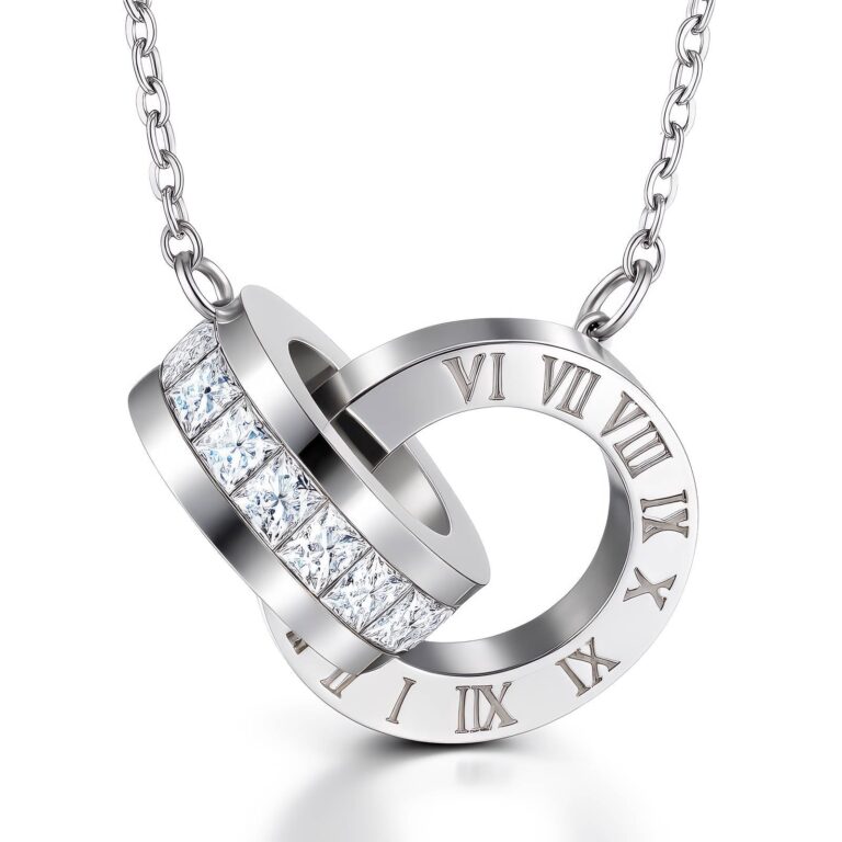 Stainless steel necklace with cubic zirconia pendants displayed on white background