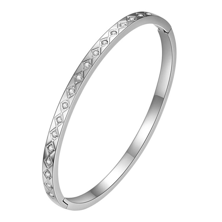Stainless steel bracelet with cubic zirconia inlays on white background