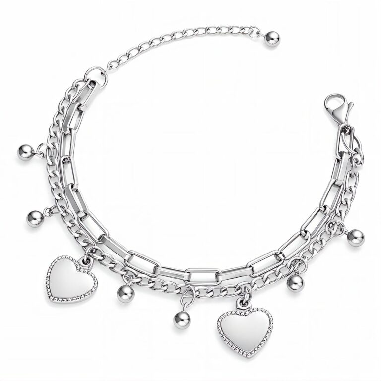 Close-up of stainless steel hearts bracelet on wrist