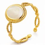 Adjustable 18K gold plated stainless steel ring with nacre detail