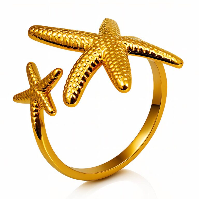 Adjustable starfish ring in 18K gold plated stainless steel on white background
