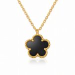Close-up of 18K gold plated flower necklace pendant