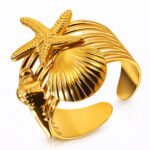 Adjustable starfish and seashell ring in 18K gold plating on a white background