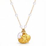 18K gold plated starfish and seashell necklace on white background