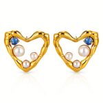 Close-up of 18K gold plated stainless steel heart stud earrings with cubic zirconia and pearl accents