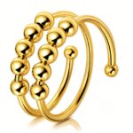 Adjustable 18K gold plated stainless steel ring on white background