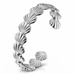 Stainless steel seashells bracelet with 6 cm diameter on white background