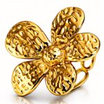 Adjustable 18K gold plated stainless steel flower ring on white background