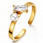Adjustable 18K gold plated steel ring with cubic zirconia and pearl imitation