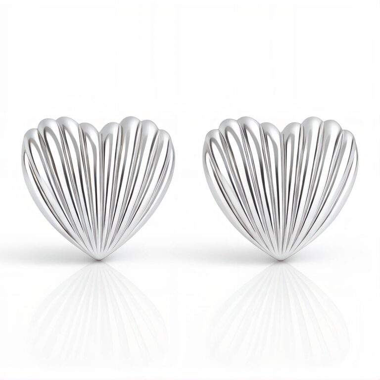 Stainless steel heart-shaped stud earrings on white background