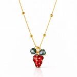 18K gold plated stainless steel strawberry pendant necklace on white background