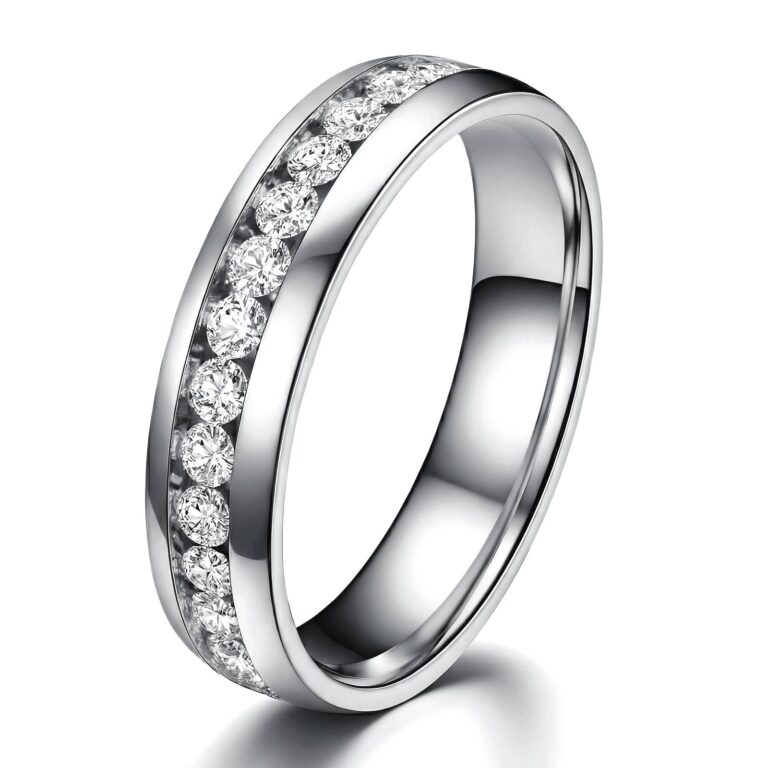 Stainless steel sized ring with cubic zirconia accents on display