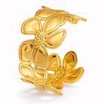 18K gold plated flower meadow stainless steel bracelet on white background