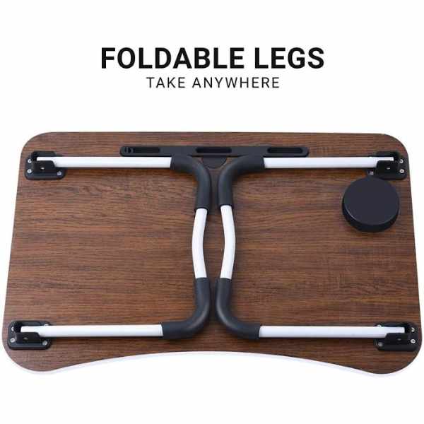 Buy-Multipurpose-Foldable-Laptop-Table-with-Cup-Holder-Study-Table-Bed-Table-Breakfast-Table-Foldable-and-Portable-At-Best-Price-Online-in-Pakistan-4_1731859099.jpg Foldable brown laptop table with tablet groove and cup holder on wooden floor