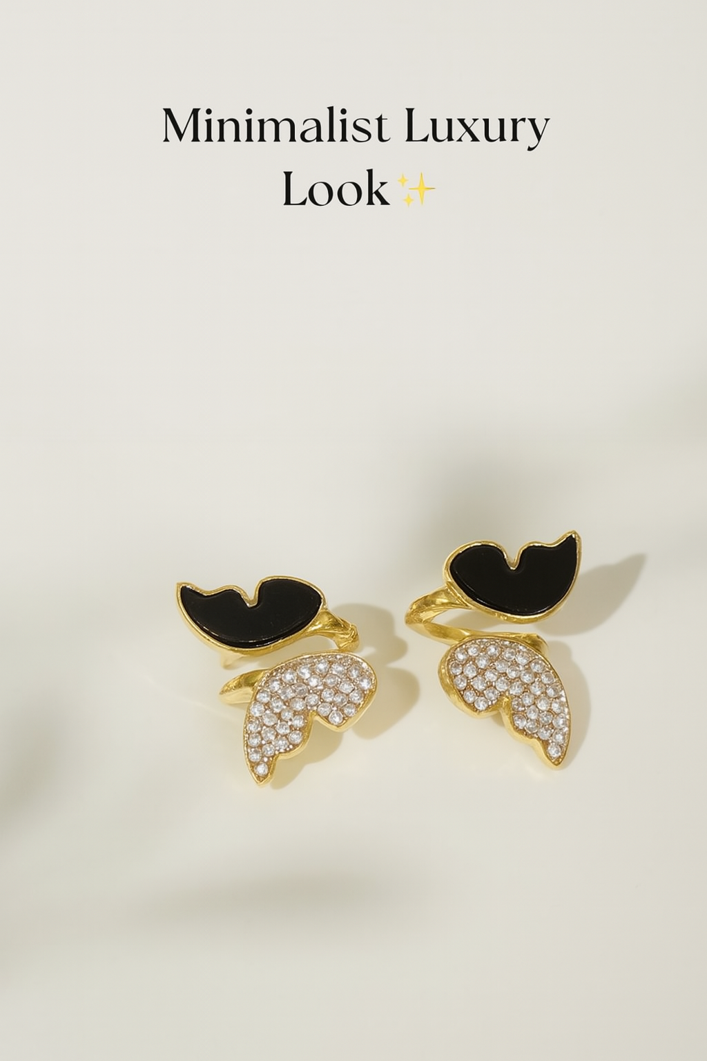 Copilot_20250826_105120.png Golden zircon butterfly earrings with black enamel close-up