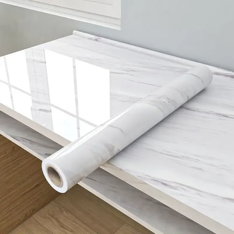 White and grey marble sheet sticker on kitchen cabinet