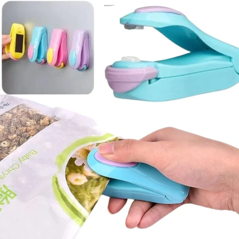Compact mini heat sealing machine on white background
