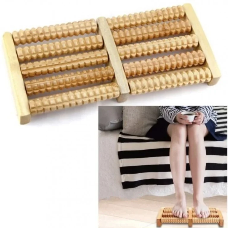 Wooden foot roller massager on white background