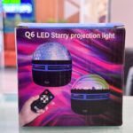 Q6 Mini LED Starry Projection Light glowing in dark room