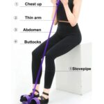 Tummy trimmer resistance band with foam handles and foot pedals