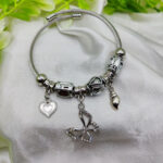Imported Pandora butterfly charm bracelet with star and heart charms