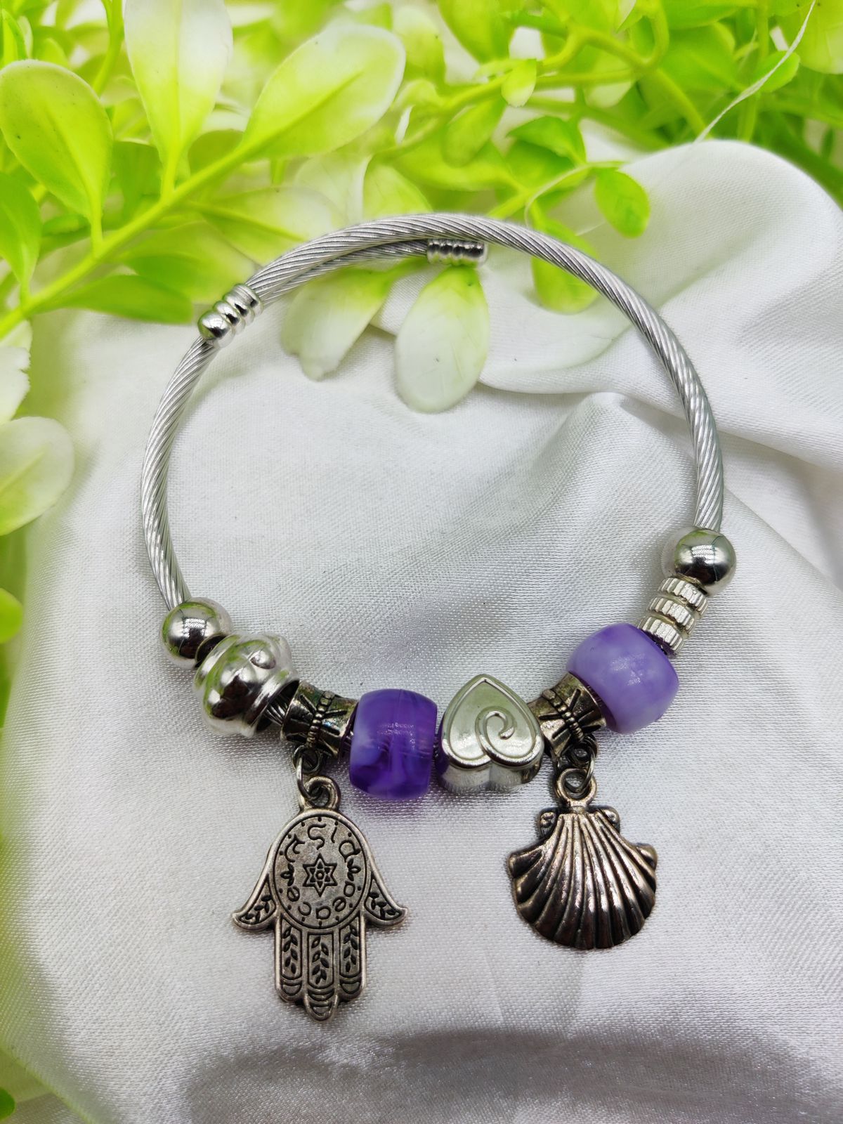 WhatsApp-Image-2025-02-04-at-4.27.33-PM.jpeg Imported Hamsa Hand Pandora charm bracelet with purple glass beads and silver accents