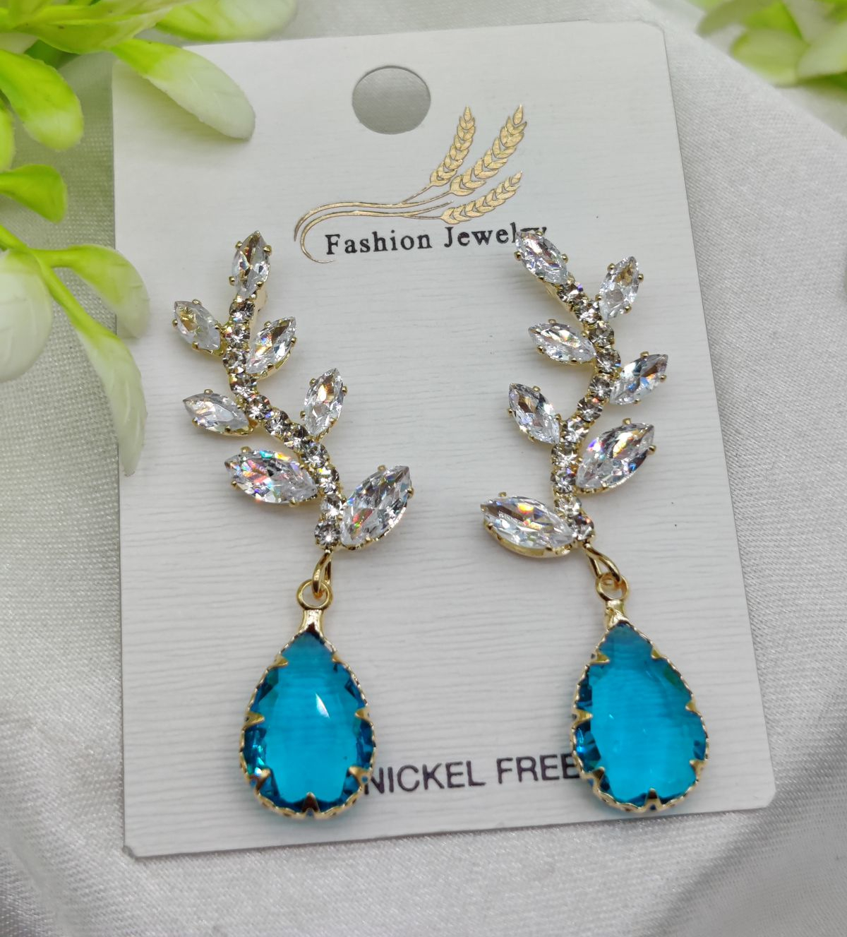 WhatsApp-Image-2025-02-05-at-1.42.22-AM.jpeg Imported Exquisite Crystal Vine Drop Earrings with Blue Gemstone Accent | Girls Earrings | Women Earrings | Jewellery - Image 1