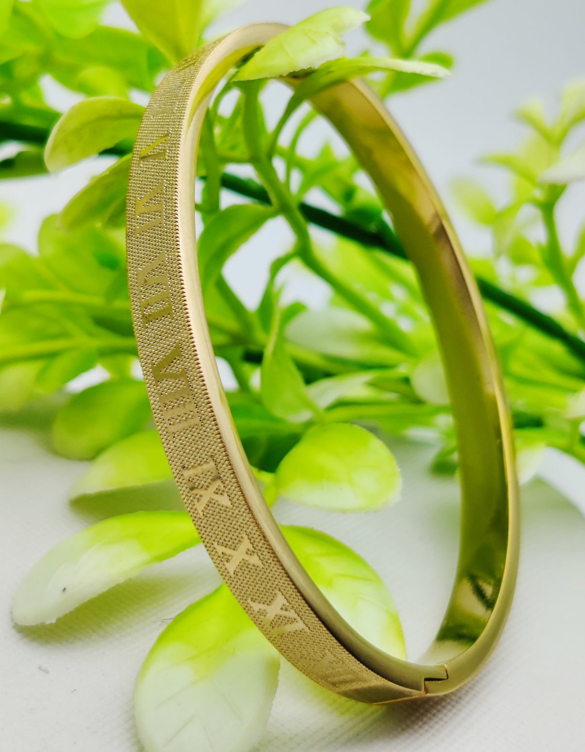 WhatsApp-Image-2025-02-05-at-11.16.59-PM.jpeg Adjustable Cartier-inspired Roman numeral gold bracelet close-up