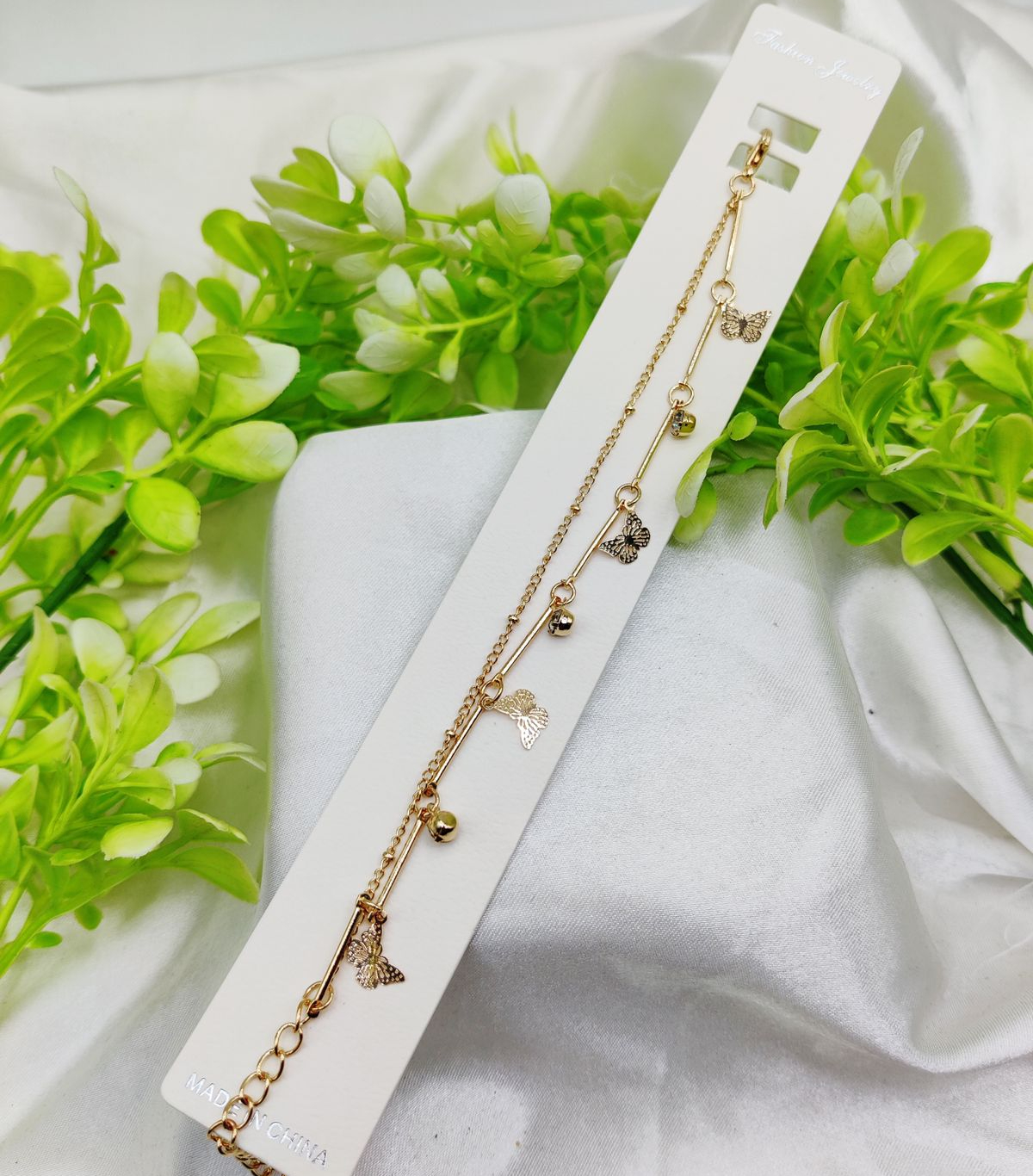 WhatsApp-Image-2025-02-06-at-4.07.14-PM.jpeg Imported adjustable bracelet with butterfly charm on wrist