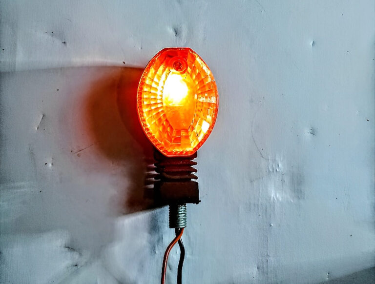 Mini motorcycle indicator with backlight on display