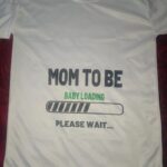 Dad to Be & Mom to Be white t-shirts with key and heart design front view