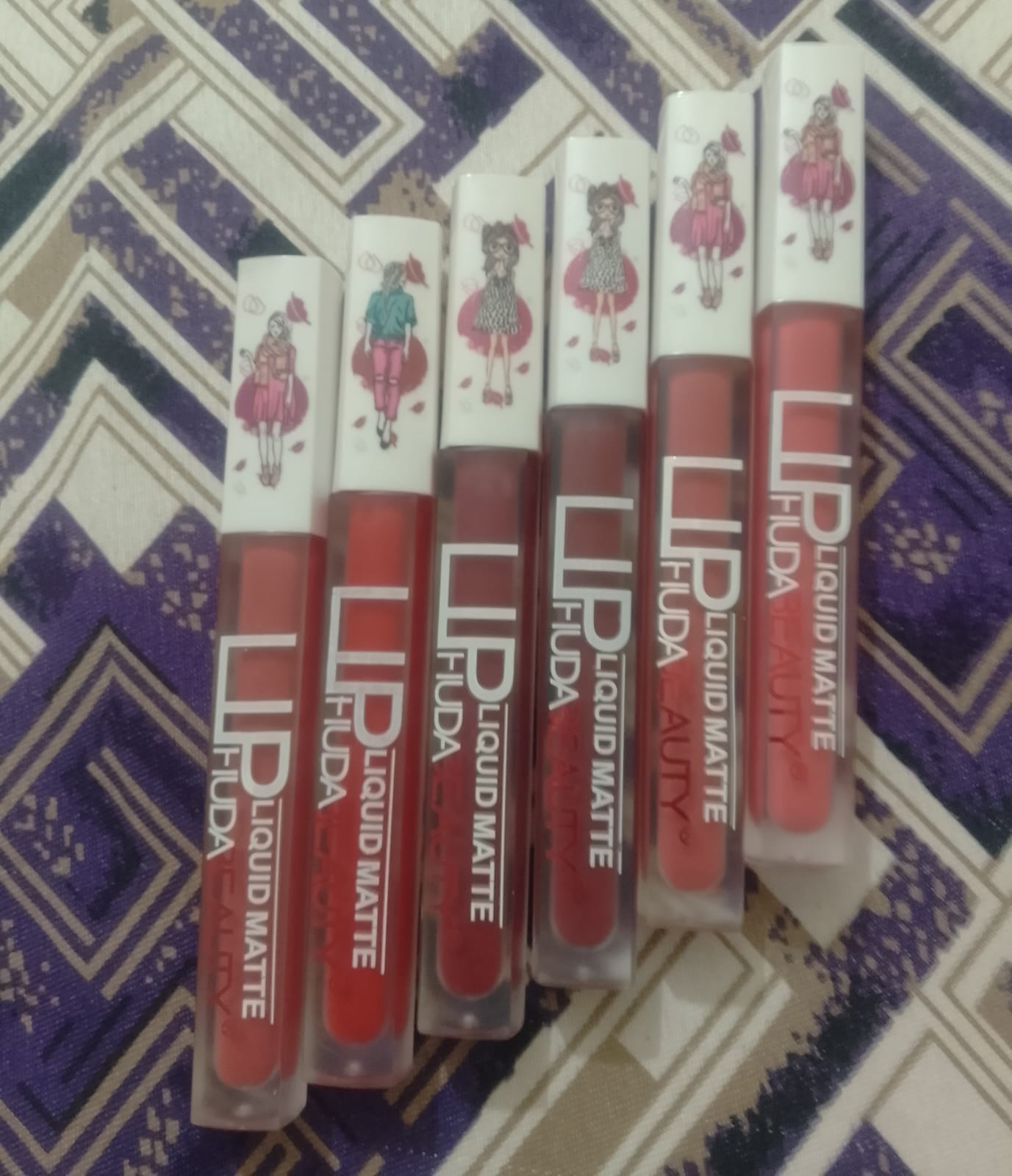 WhatsApp-Image-2025-04-26-at-4.05.51-PM-1.jpeg 6-piece matte lip gloss set in assorted multicolor shades displayed
